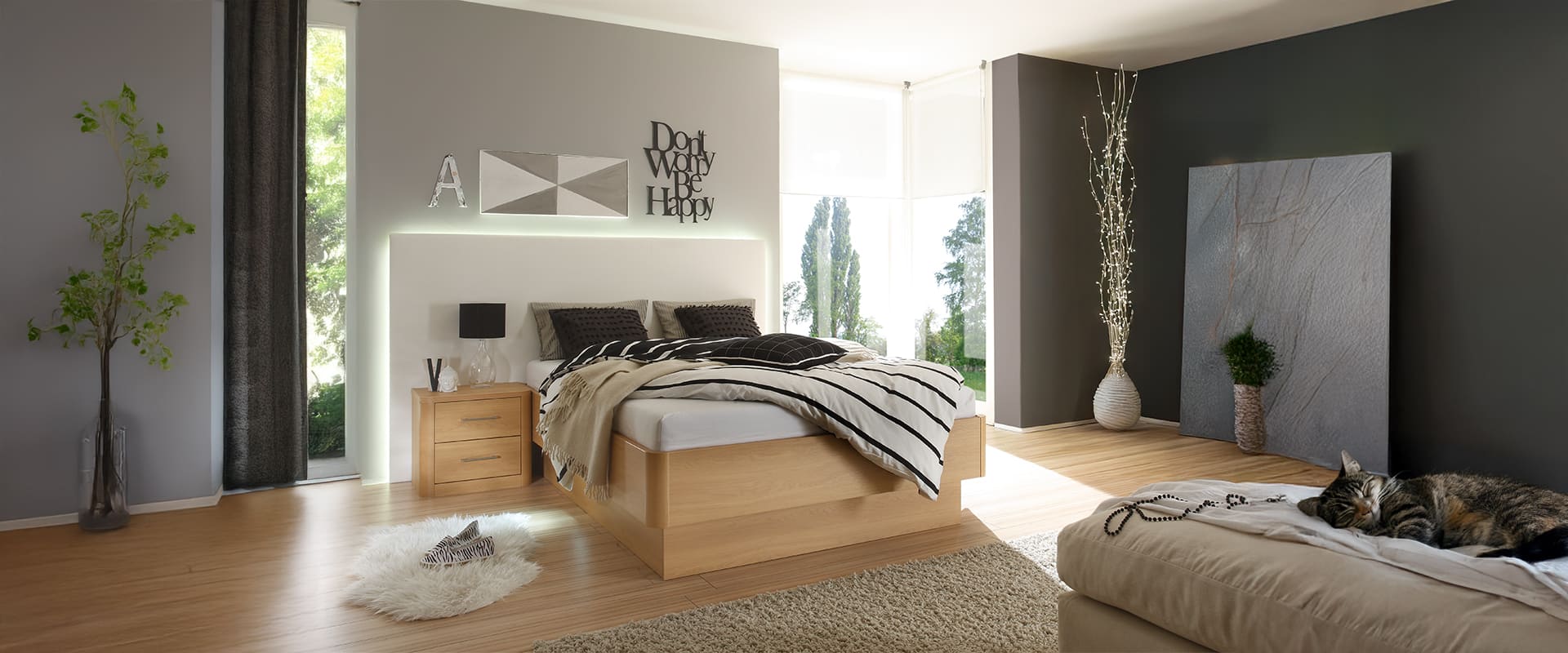 Bett Comfort 4 mit 4 gerundeten Ecken. Links neben dem Bett steht eine Nachtkonsole, wo vorne die Ecken ebenfalls gerundet sind