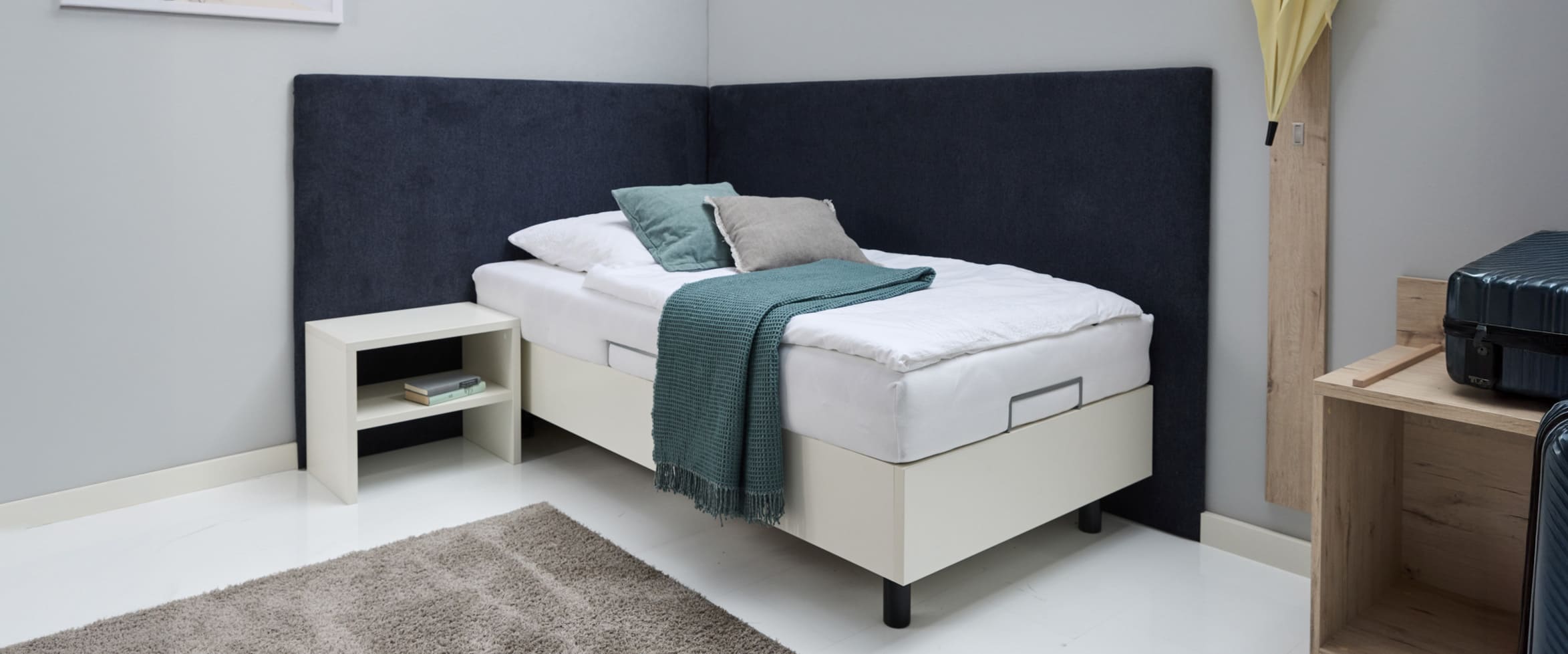 gepolsterte Rückwand in Verbindung mit einem Bett Compact für den Hotelbereich